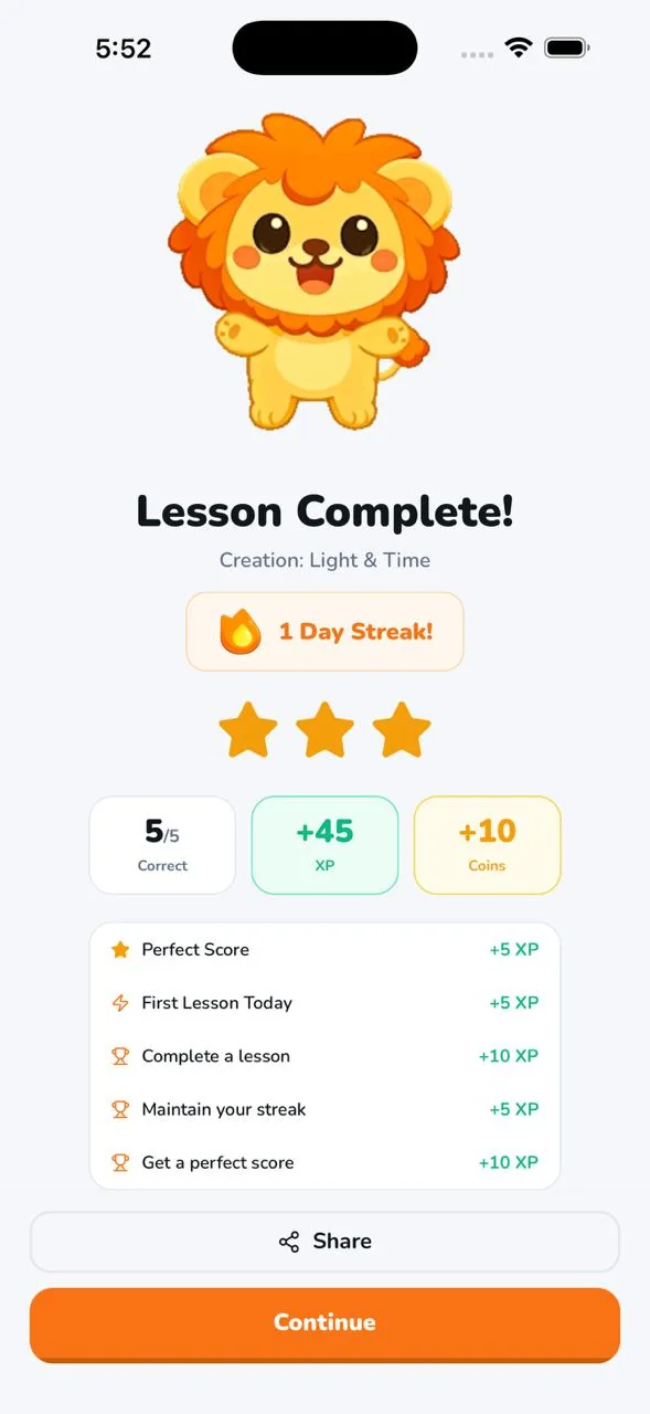 Lesson complete screen with stars, XP and coins earned